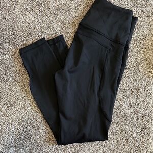 Black Athleta ultimate stash 7/8 tights size XS